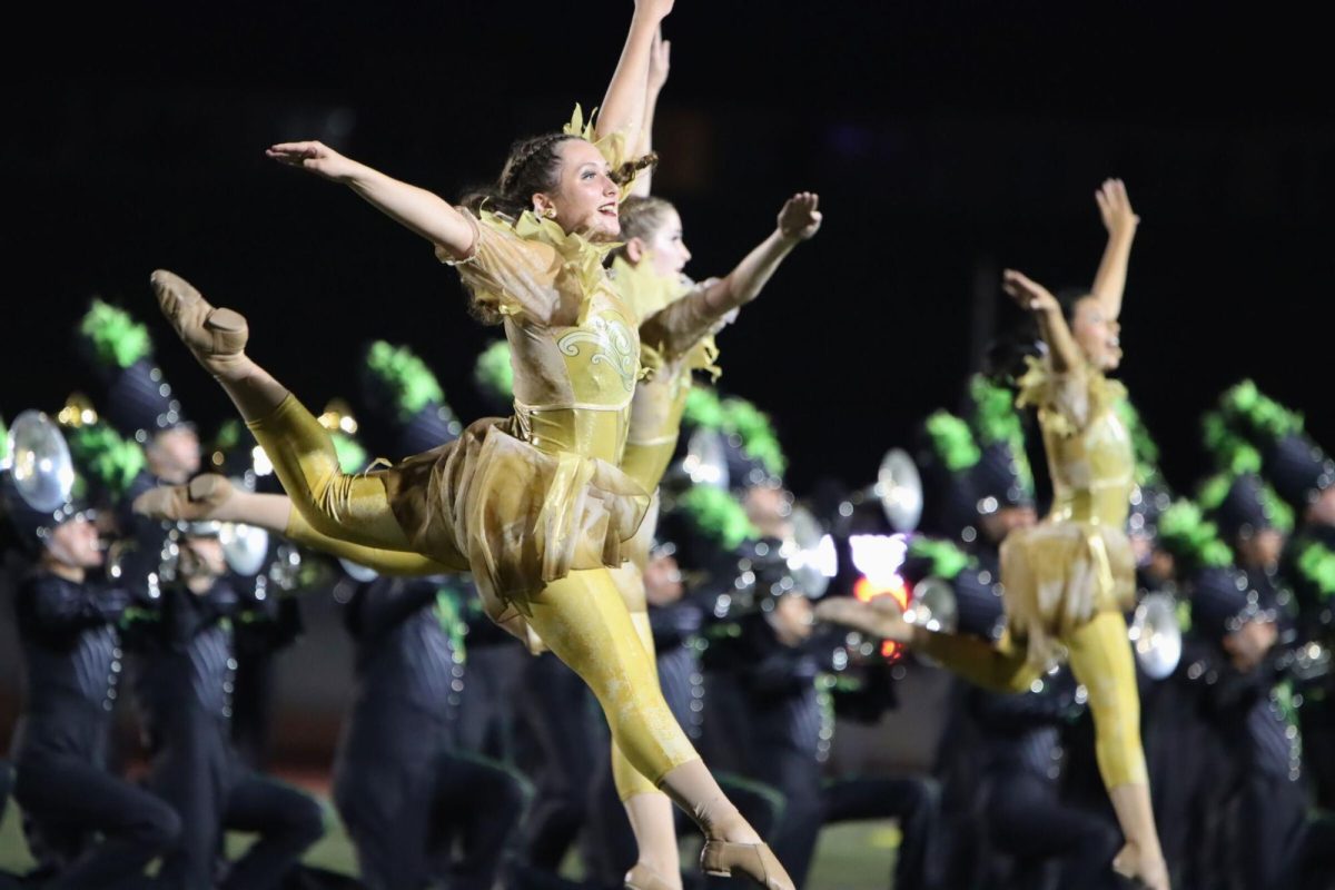 Band dancer Kylie Hurst performs during the debut of “Fallen” at the NEISD Fall Festival.