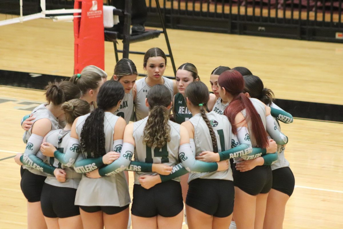 Varsity volleyball girls lock in for a win against Churchill on Friday, Sept. 27.