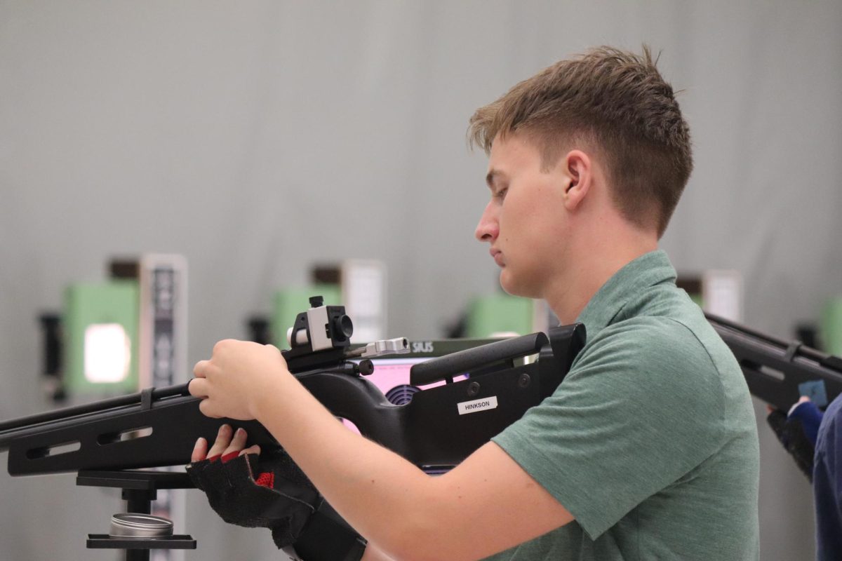 Junior Carson Hinkson competes Thursday, Sept. 19, during the NEISD Air Rifle Season Opener.