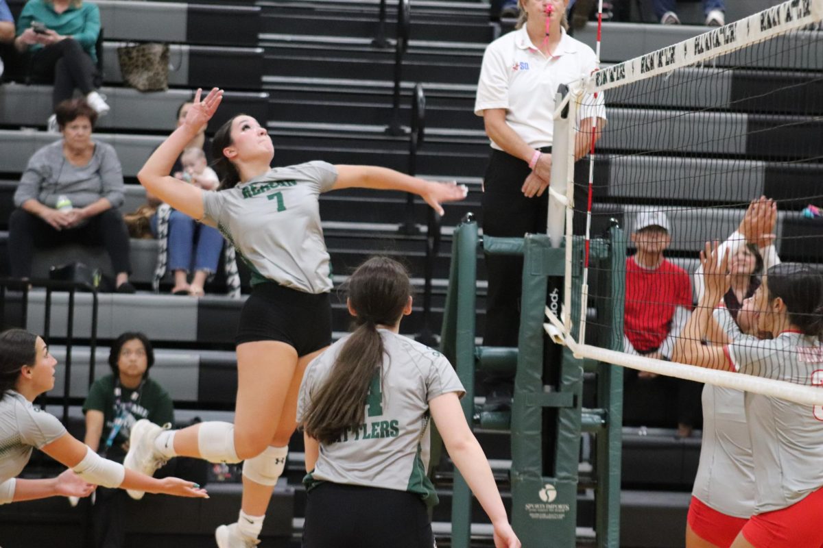 Breanne Velonis #7 moments before she spikes the ball at LEE during the Reagan VS LEE Volleyball game on Oct. 18th.  