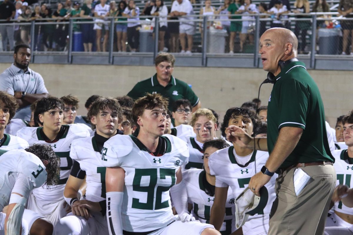 Coach Ham Gives a Speech to the Varsity Boys after winning the Brennan football game.