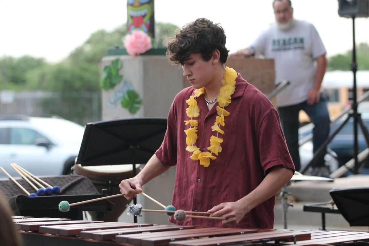 Senior Brandon Lucero plays his solo, "Strive To Be Happy", after winning his division in the Concerto Solo Contest.