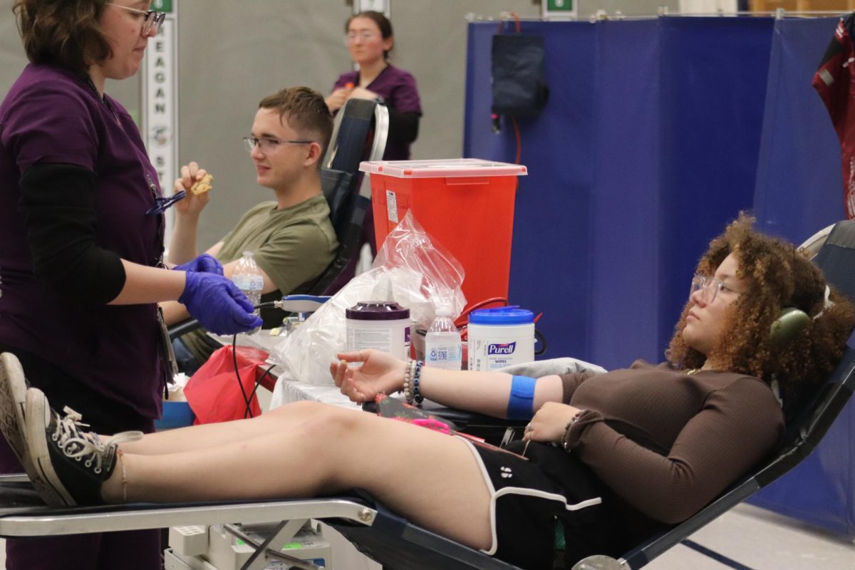 Students donating their blood for the April blood drive.