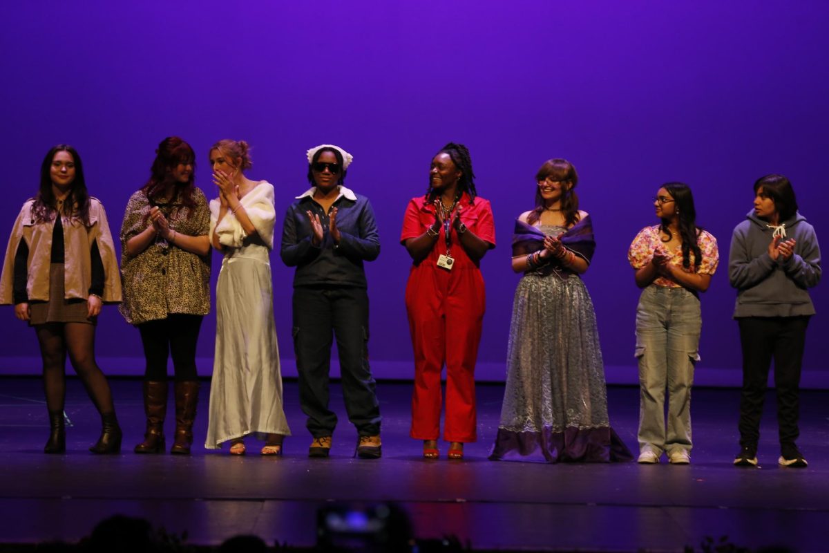 More than 50 students took the stage to showcase their original designs during this year’s annual fashion show, held Friday, April 11, in the auditorium. The event, hosted by the Fashion Club, followed the theme “Fashion Through the Seasons.”
