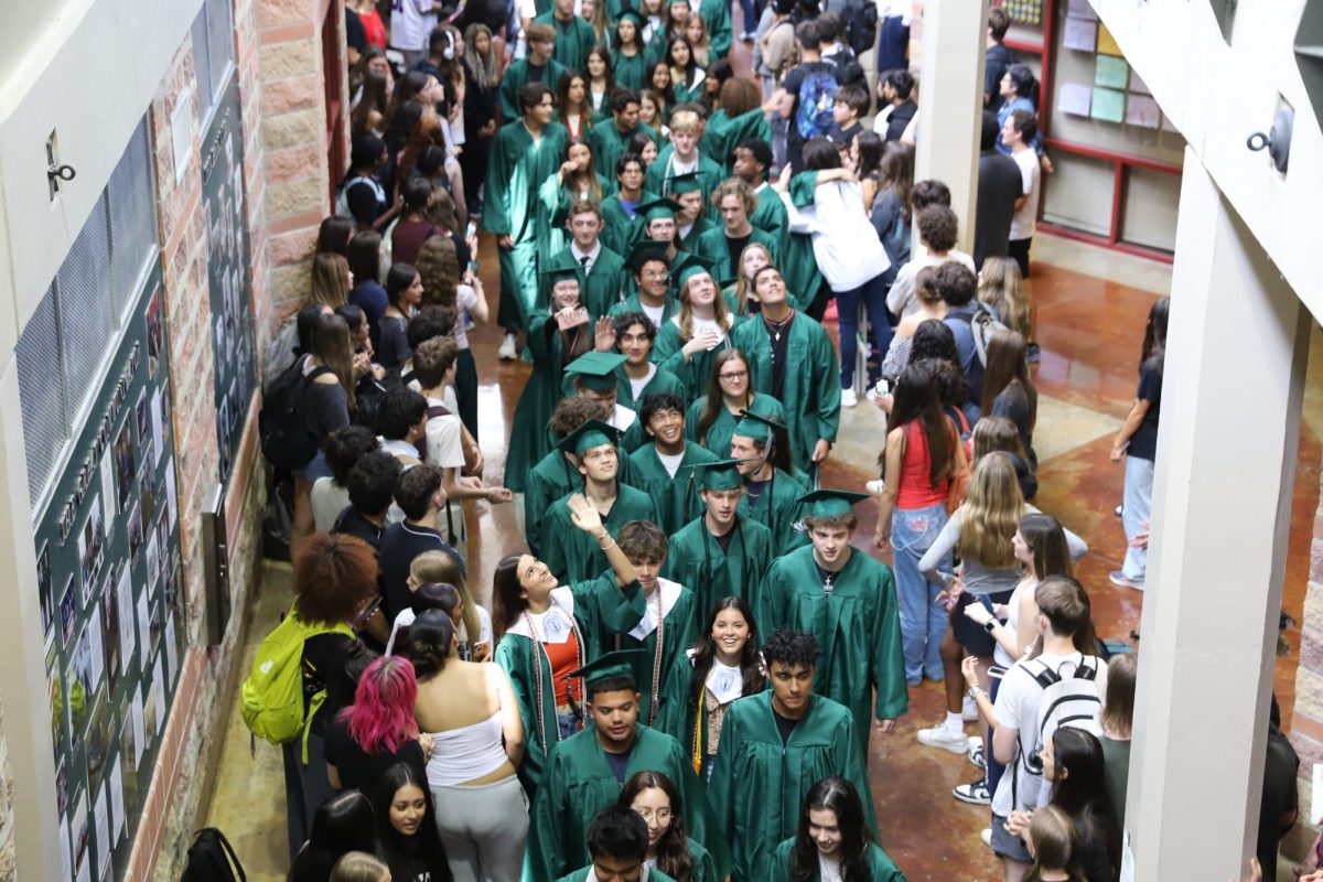 Wearing their caps and gowns, the Class of 2025 took their final stroll through the halls during the traditional Senior Walk on Wednesday, May 21. They marked the end of their high school journey with smiles, waves, and a few teary goodbyes.