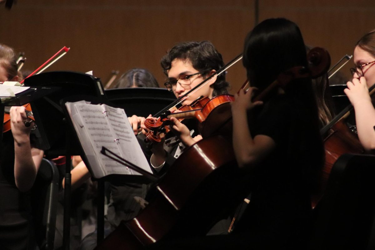 Orchestra students perform during "A Night from Broadway" concert Monday in the auditorium. The event featured songs from popular shows like "Wicked," "Hamilton," "West Side Story," and "Jersey Boys."