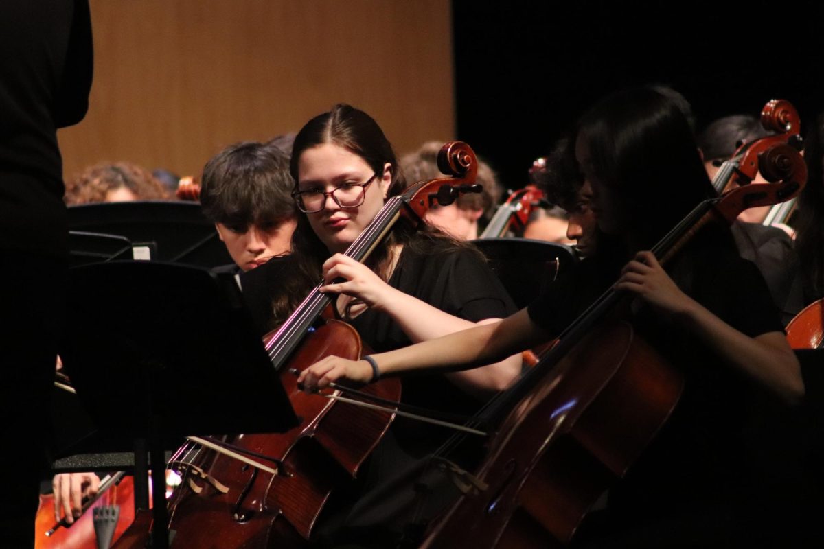 Orchestra students perform during "A Night from Broadway" concert Monday in the auditorium. The event featured songs from popular shows like "Wicked," "Hamilton," "West Side Story," and "Jersey Boys."