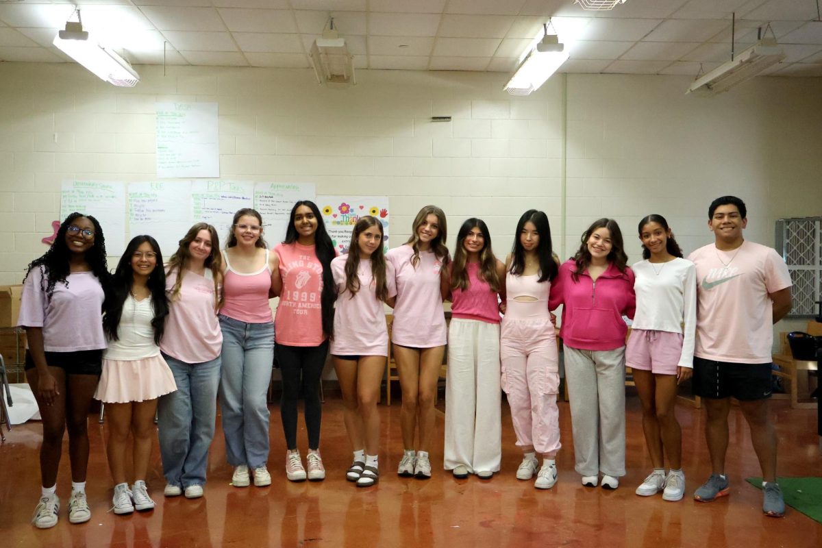 Students and faculty at Reagan High School showed their school spirit during Homecoming Week, dressing up for themed days like We Wear Pink Wednesday.