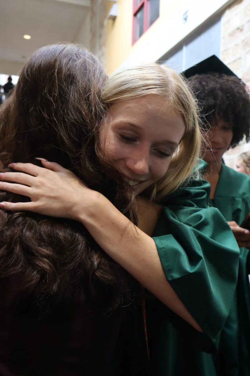 Seniors take their last walk through Independent Hallway on Thursday, May 21, as students and teachers line the corridors to bid them farewell before graduation. Graduation was held on Saturday, May 23 at the Alamodome, where more than 845 students received their diplomas.